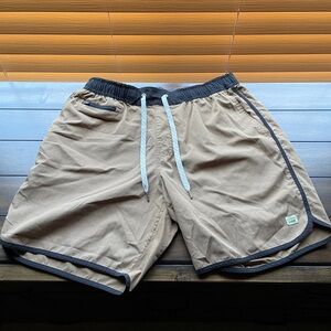 Vuori Tan Shorts with Black Accents